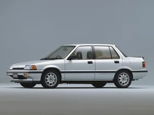 AT (1985–1987)